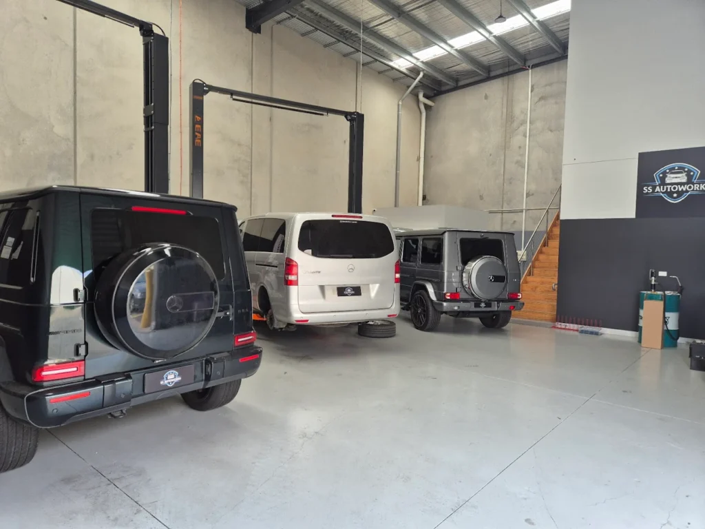 Mercedes-Benz vehicles in a modern garage setting
