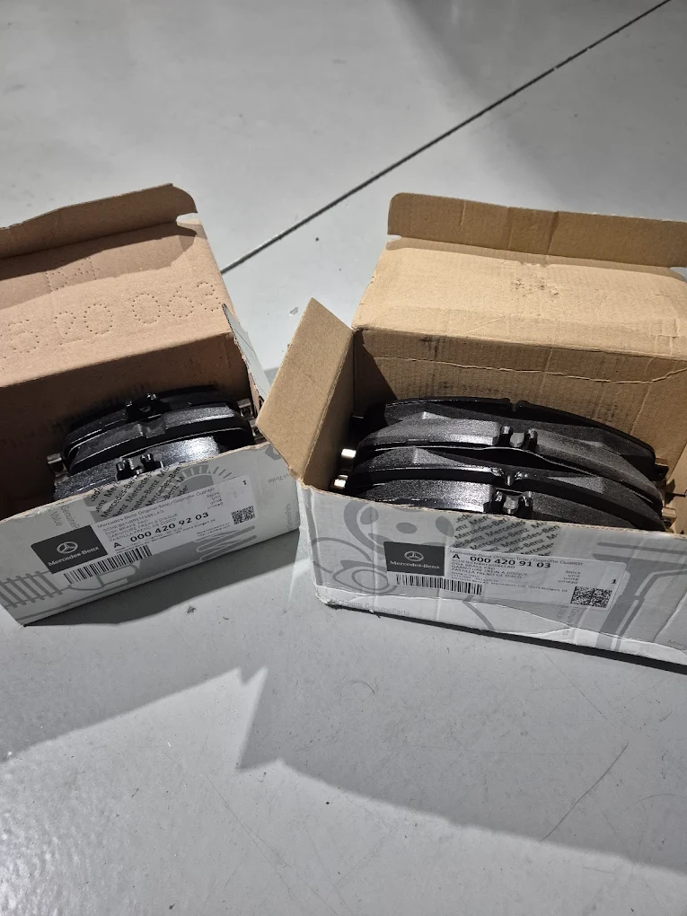 Mercedes-Benz brake pads displayed in open boxes